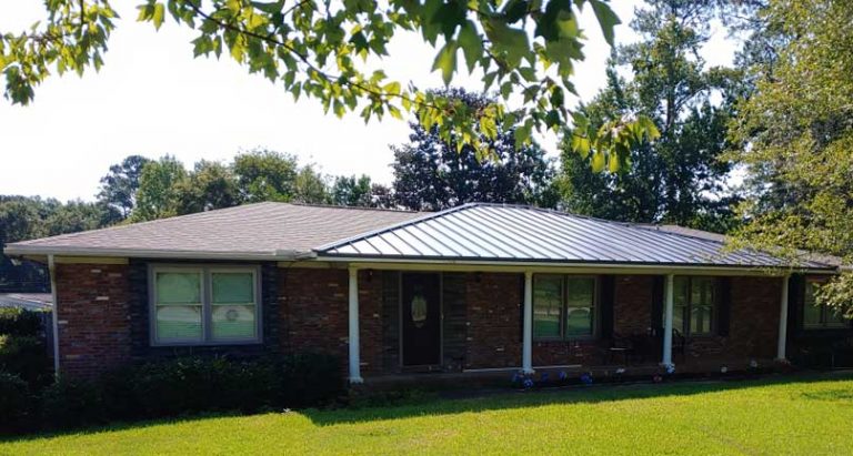 Shingle to Metal roof transition with Lock-seam metal roof accenting shingle multiple roofing system install.